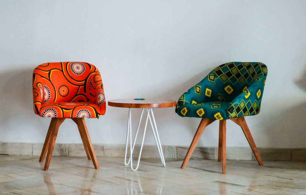 Two upholstered colorful armchairs