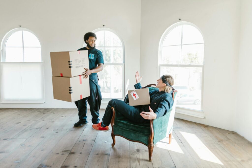 two movers handling furniture